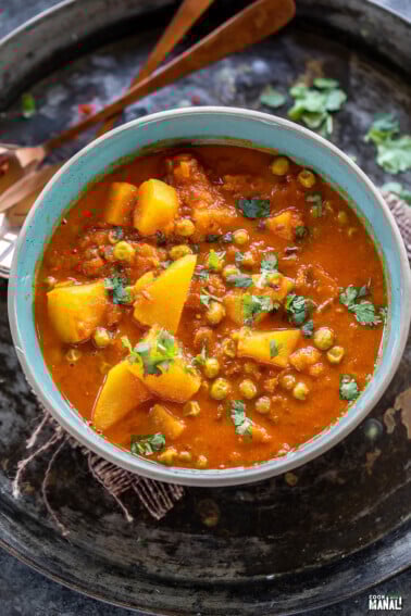 aloo matar served in a blue color bowl