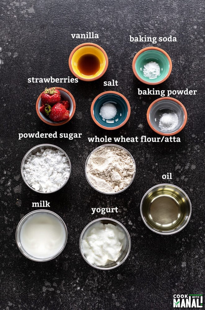 ingredients for eggless strawberry muffins arranged on a board