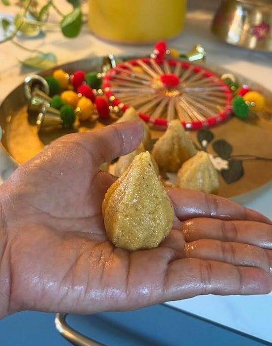 modak placed on a hand