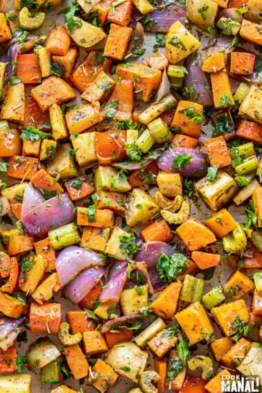 assorted roasted veggies on a baking tray